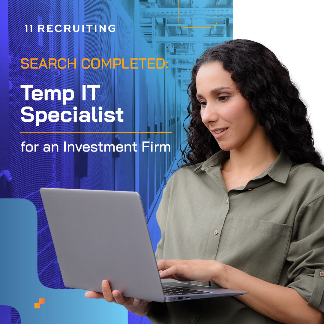 A Temp IT Specialist woman holding her laptop wearing gray long sleeve in white text